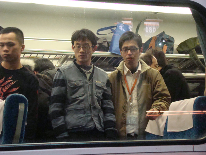 台灣鐵路旅遊攝影電車-區間車窗戶旁的旅客攝影照片12