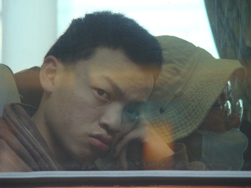 台灣鐵路旅遊攝影電車-區間車窗戶旁的旅客攝影照片21