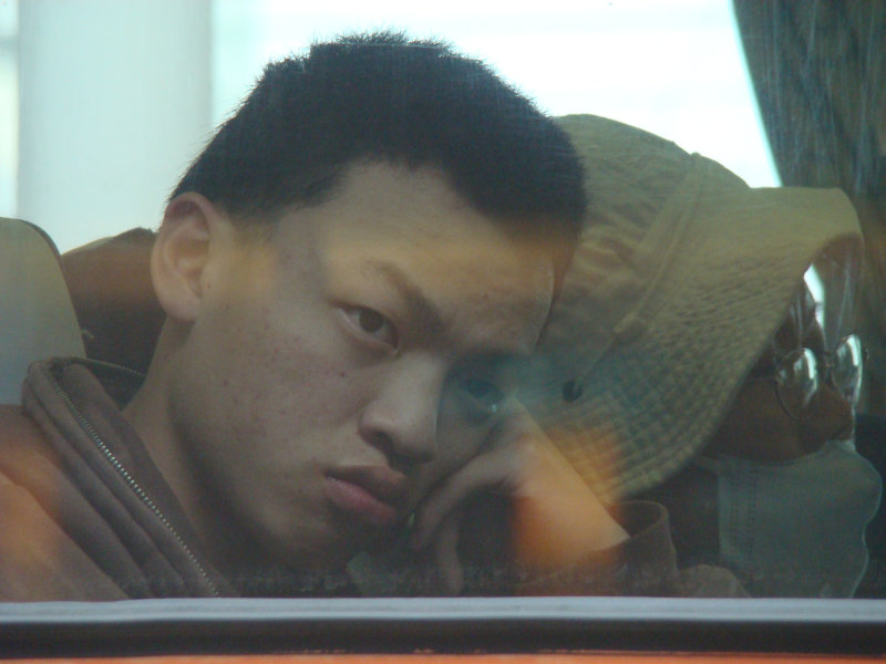 台灣鐵路旅遊攝影電車-區間車窗戶旁的旅客攝影照片22